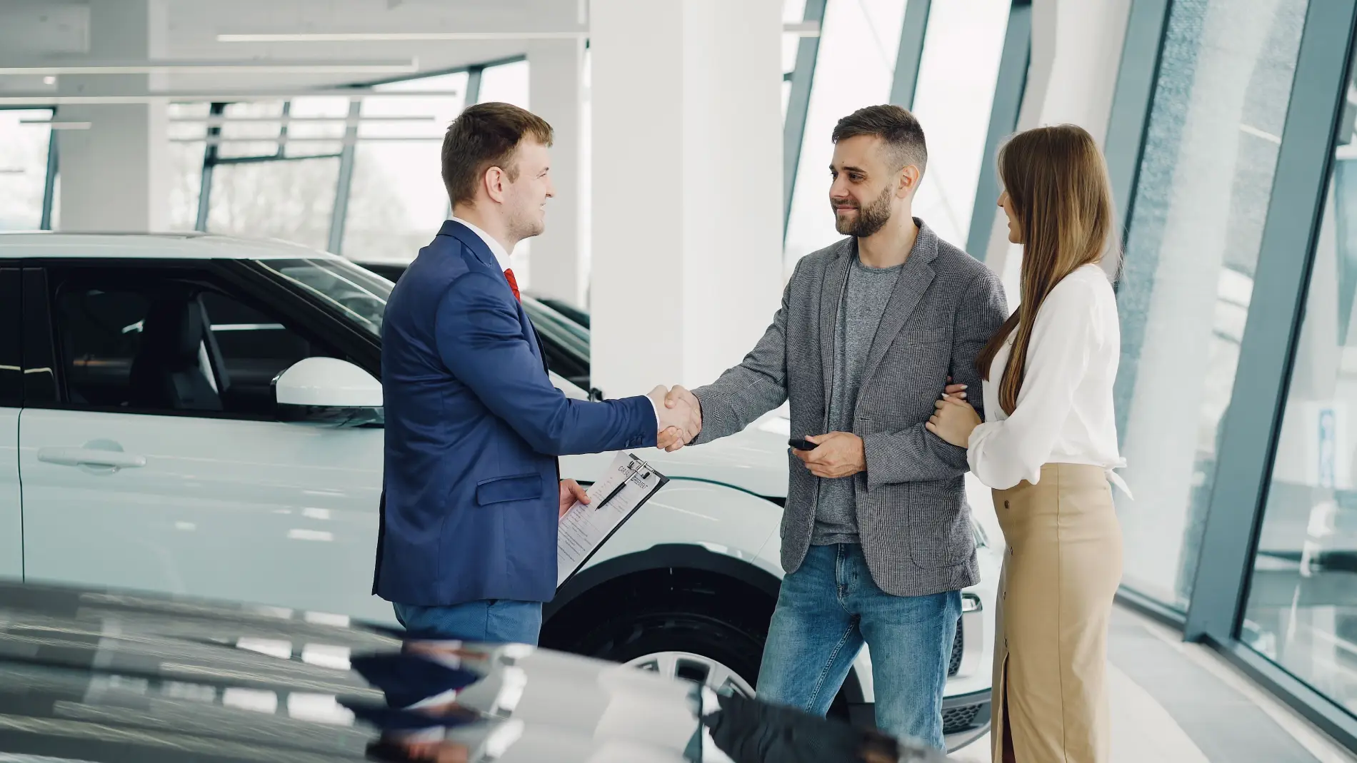 Buyer and seller shaking hands at the close of a concierge practice sale